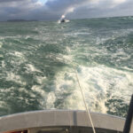 A Coast Guard Station Humboldt Bay 47-foot Motor Lifeboat crew tows the 45-foot commercial fishing vessel Miss Jessie near Humboldt Bay, April 30, 2018. Watchstanders launched a MH-65D helicopter crew from Sector Humboldt Bay and a 47-foot Motor Lifeboat crew and once on scene, the MLB boat crew towed the vessel back to shore. (U.S. Coast Guard photo/Released)